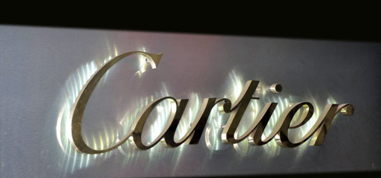 backlit brass Logo sign 