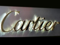 backlit brass Logo sign